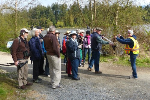 Megan agrees to take group photo